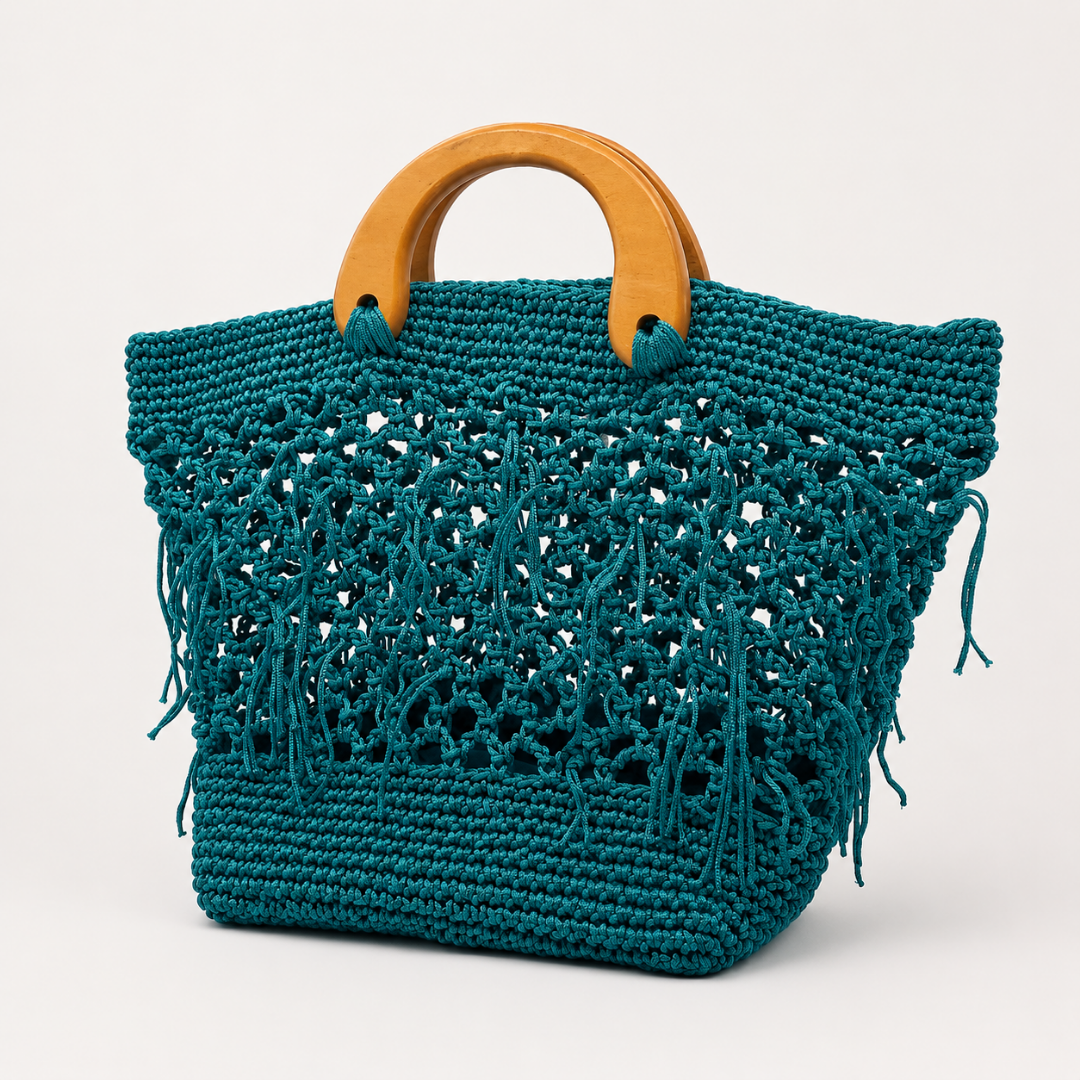 Borsa Tonda Iblea verde acqua fatta a mano con effetto rete e dettagli pendenti