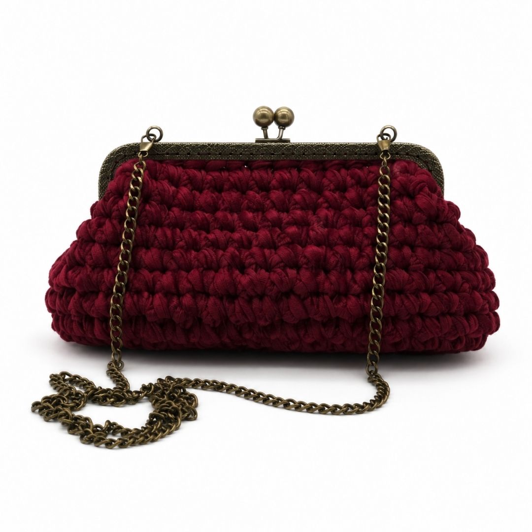 Borsa artigianale Granato modello clutch bordeaux con chiusura vintage in metallo